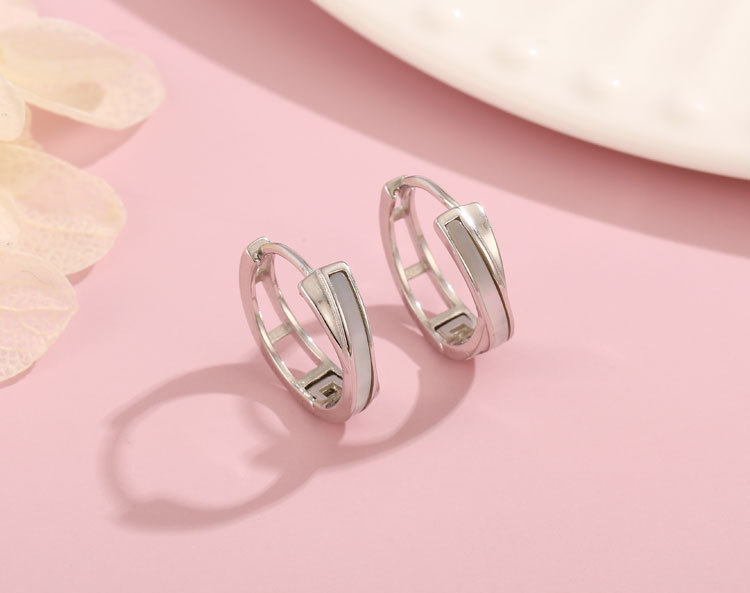 S999 Silver Unique Cross Shell Earrings
